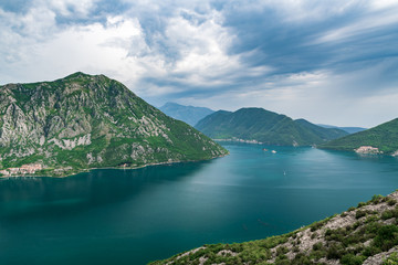 Naklejka na ściany i meble Famous Gospa-od-Shkrpjela from a bird's-eye view of the Boko-Kotor Bay in Montenegro