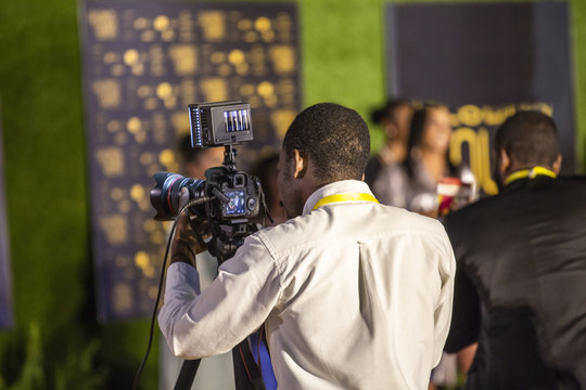 African Mustache Photographer With Camera