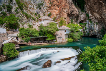 Fototapeta na wymiar Beautiful village Blagaj and waterfall on Buna spring and waterfall in Bosnia and Herzegovina