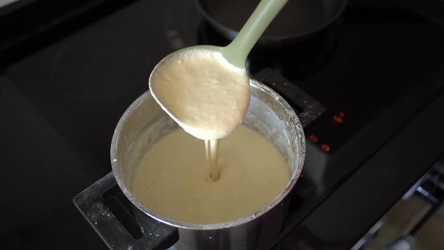 Cooking american style pancakes on kitchen