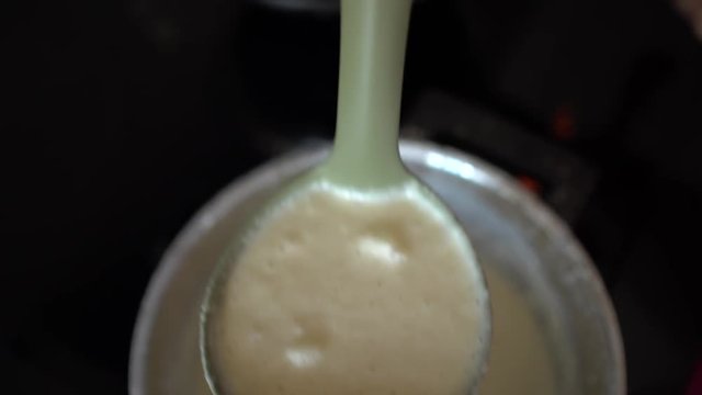 Cooking american style pancakes on kitchen