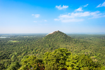 Obraz premium View to the Pidurangala rock, a few kilometers north of the historical fort Sigiriya