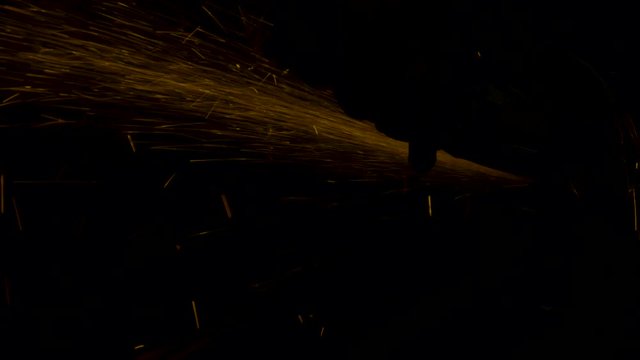 sparks effect - worker cutting iron