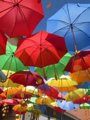 Fototapeta na wymiar Colorful umbrellas hanging