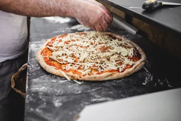 Foto op Aluminium Close up shot of pizza making or preparing process © Dusko