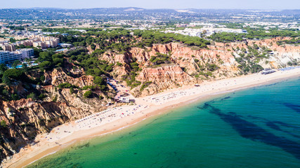 Beautiful Falesia Beach in Portugal seen from above. Portugal algarve beaches aerial view.