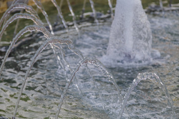 Fountain in the city park close-up on a sunny day.
