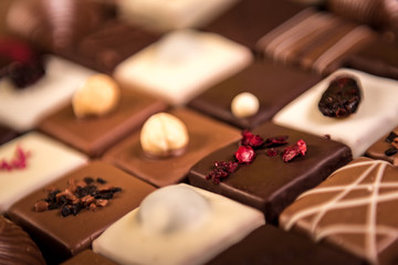 Assortment of fine chocolate candies, white, dark and milk chocolate