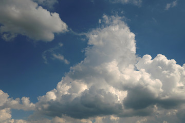 Naklejka na ściany i meble White clouds and blue sky - Stockphoto