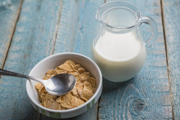 Cornflake cereals in a white bowl