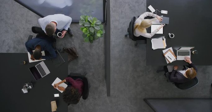 young multi ethnic business people working in office colleagues meeting discussing corporate strategy together sharing ideas top view professional career