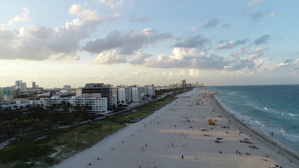 Aerial view of people relaxing on the beach in Miami.