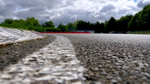 Low pan shot on a race track