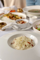 Close-up risotto with chanterelle mushrooms and grated parmesan