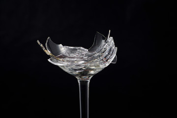 Broken glass in front of black background photographed under the name glass shards cocktail
