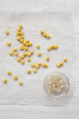Obraz na płótnie Canvas Peeled chickpeas for hummus prep, view from above. Flat lay, overhead.