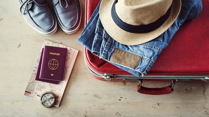 Preparing travel suitcase high angle view