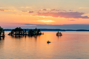Fototapeta na wymiar Fishing in summer evening, Finland