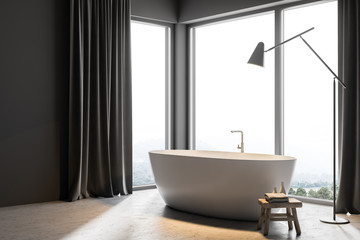 Naklejka na ściany i meble White bathtub in gray curtains bathroom side view