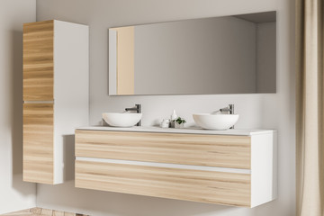 Fototapeta na wymiar Double sink in white and wooden bathroom side