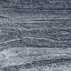 Migmatitic gneiss migmatite rock bands pattern grey light dark banded granite texture macro closeup textured silver gray horizontal background coarse grained feldspar quartz mica minerals gneissic