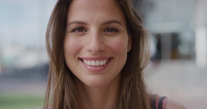 close up portrait beautiful young woman smiling enjoying successful lifestyle looking cheerful slow motion