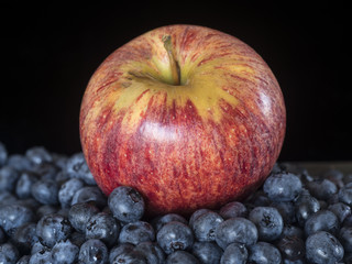 Gala apple on Blueberries