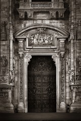 Fototapeta na wymiar Milan Cathedral door