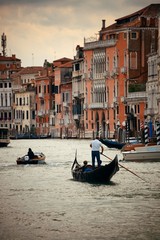 Fototapeta na wymiar Gondola in canal in Venice