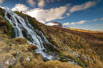 Fototapeta na wymiar Brides Veil Waterfall and Old man of Storr , Isle of Skye , Scotland