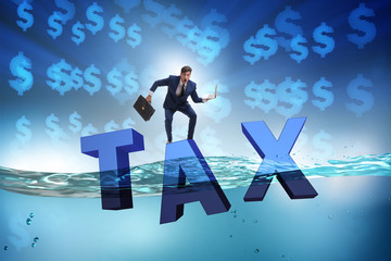 Businessman having problems with paying taxes