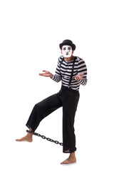 Mime with his feet chained isolated on white