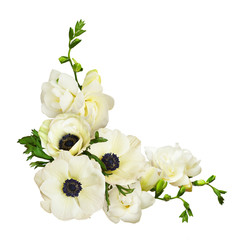 White anemones and freesia flowers in a corner arrangement