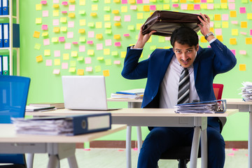 Businessman with many conflicting priorities   