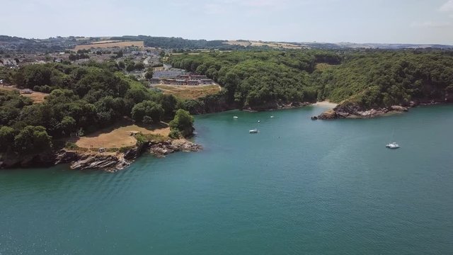 Aerial view of beach in Brixham, England. Beach cove of coast in England.