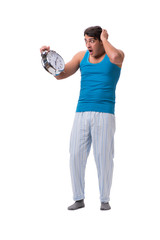 Man waking up with alarm clock isolated on white