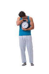 Man waking up with alarm clock isolated on white