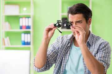 Fototapeta premium Computer engineer repairing broken desktop
