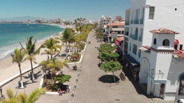 Flying over Puerto Vallarta seaside promenade, a 12 mile long walking esplanade in Puerto Vallarta, Mexico.