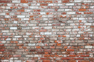 Empty red brick wall textured background. Close-up