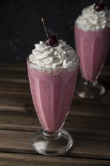 Cherry milkshake with whipped cream