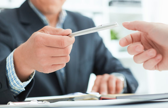 Male Arm In Suit Offer Silver Pen To Sign Contract Closeup. Strike A Bargain For Profit, White Collar Motivation, Union Decision, Corporate Sale, Insurance Agent Concept