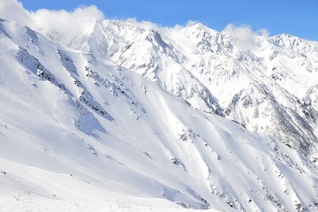 Fototapeta na wymiar Hakuba snow mountain in Nagano Japan sunny weather