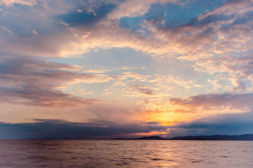 Fototapeta na wymiar Dawn on the sea in summer.