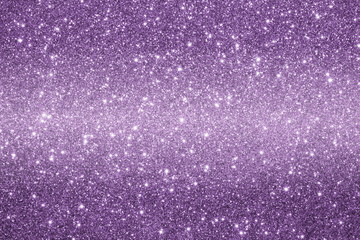 красивый фиолетовый фон из блесток с бликами и боке         
