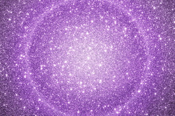  красивый фиолетовый фон из блесток с бликами и боке         