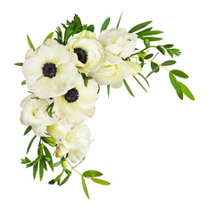 White anemones, eucalyptus leaves and freesia flowers in a corner arrangement