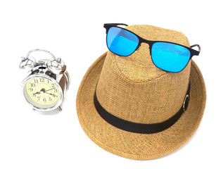 accessories and time for travel, hat fasion vintage straw style  for man and woman with sun glasses, vintage retro alarm stainless clock isolated on white background with copy space