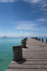 Empty wooden jetty in a lonely environment with a fantastic sea view of the Caribbean Sea