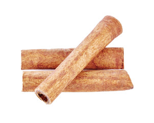 Top view of cinnamon sticks isolated on white